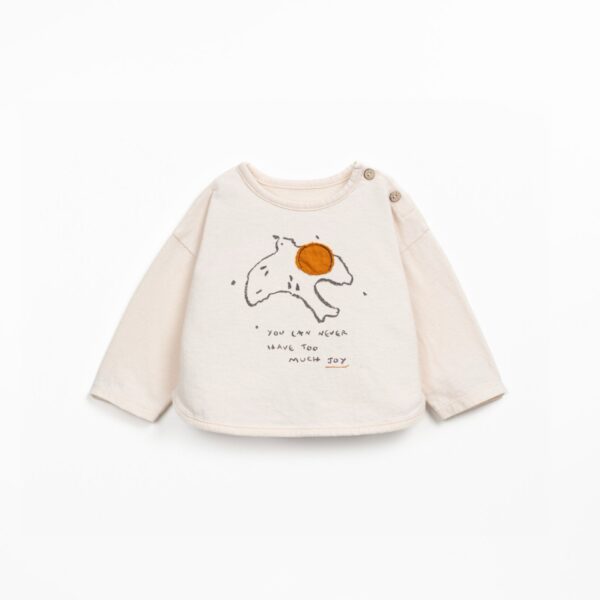 T-shirt con disegno sul davanti e apertura sulla spalla